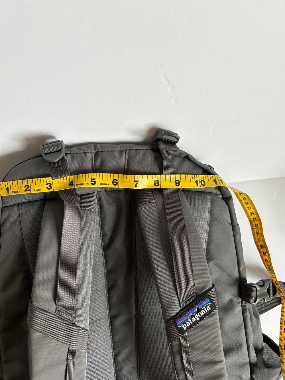 Patagonia Gray Backpack with Yellow Bungee Accents